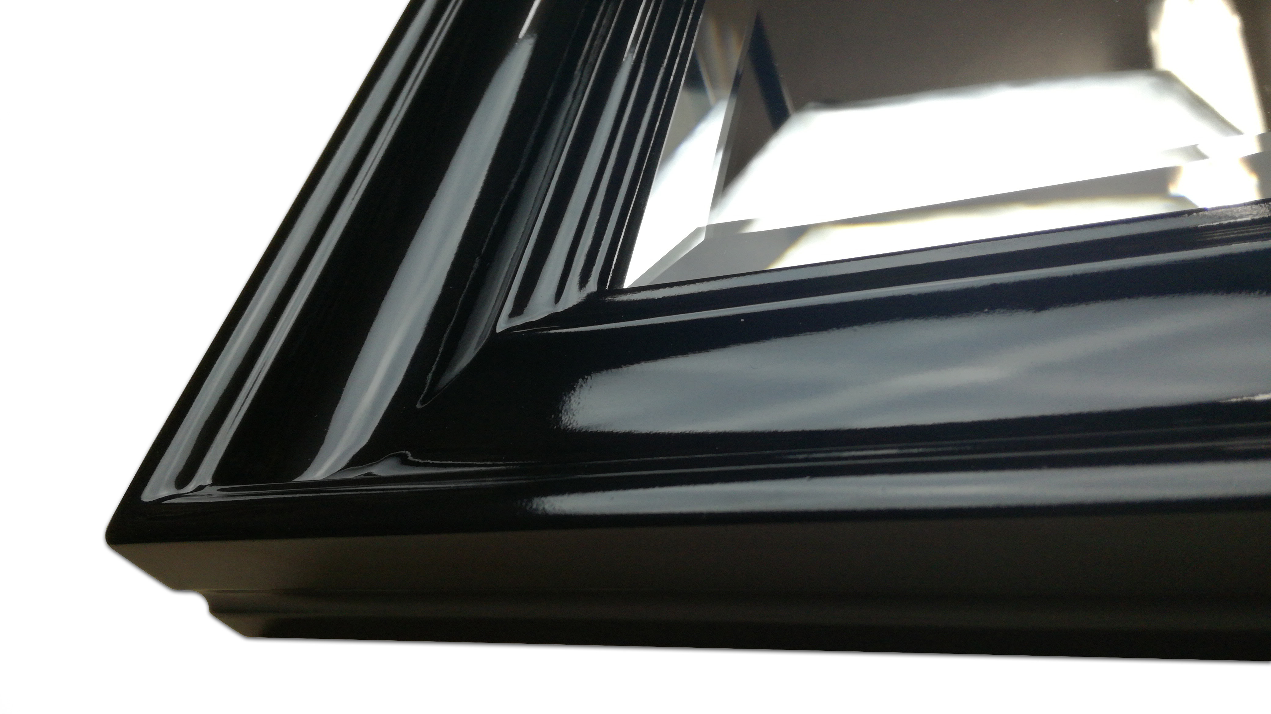 Mirror in a black high gloss frame